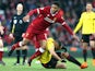 Richarlison and Joe Gomez in action during the Premier League game between Liverpool and Watford on March 17, 2018