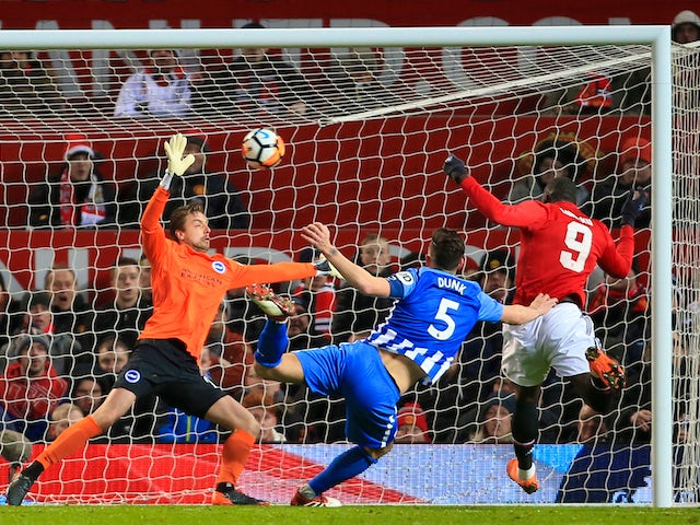 Romelu Lukaku scores the opener during the FA Cup quarter-final between Manchester United and Brighton & Hove Albion on March 17, 2018