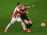 Xherdan Shaqiri and Oleksandr Zinchenko in action during the Premier League game between Stoke City and Manchester City on March 12, 2018