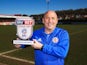 Accrington Stanley manager John Coleman poses with the League Two manager of the month award for March 2018