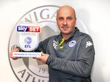 Wigan Athletic manager Paul Cook poses with his League One manager of the month award for March 2018
