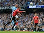 Vincent Kompany opens the scoring during the Premier League match between Manchester City and Manchester United on April 7, 2018