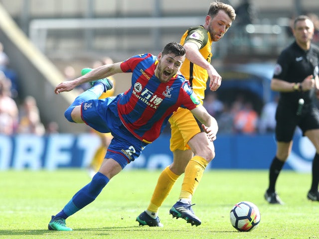 Joel Ward and Dale Stephens during the Premier League match between Crystal Palace and Brighton & Hove Albion on April 14, 2018