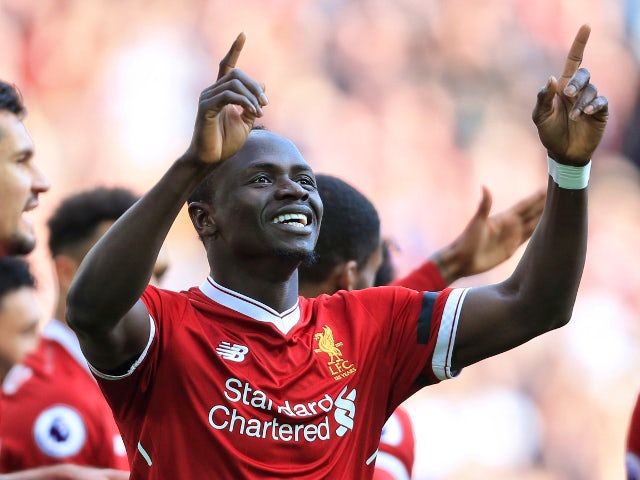 Sadio Mane celebrates scoring in the Premier League game between Liverpool and Bournemouth on April 14, 2018