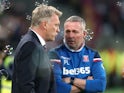 David Moyes and Paul Lambert at the Premier League match between West Ham United and Stoke City on April 16, 2018