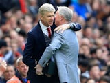 Sir Alex Ferguson embraces Arsenal manager Arsene Wenger on April 29, 2018