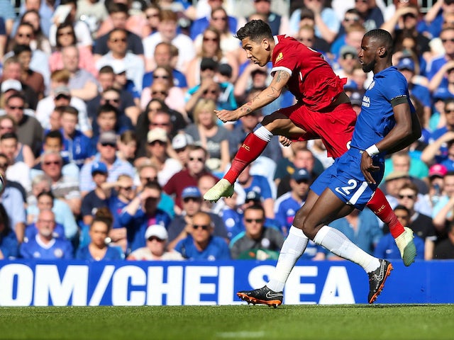 Roberto Firmino takes a shot during the Premier League game between Chelsea and Liverpool on May 6, 2018