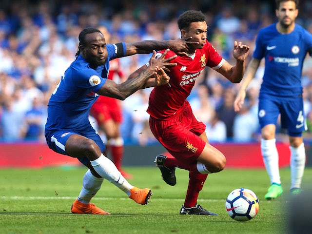 Victor Moses battles with Trent Alexander-Arnold during the Premier League game between Chelsea and Liverpool on May 6, 2018