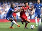 Victor Moses battles with Trent Alexander-Arnold during the Premier League game between Chelsea and Liverpool on May 6, 2018