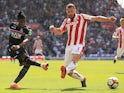 Wilfried Zaha and Erik Pieters in action during the Premier League game between Stoke City and Crystal Palace on May 5, 2018