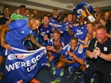 Cardiff City players and staff celebrate promotion to the Premier League on May 6, 2018
