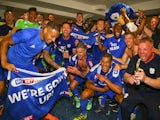 Cardiff City players and staff celebrate promotion to the Premier League on May 6, 2018