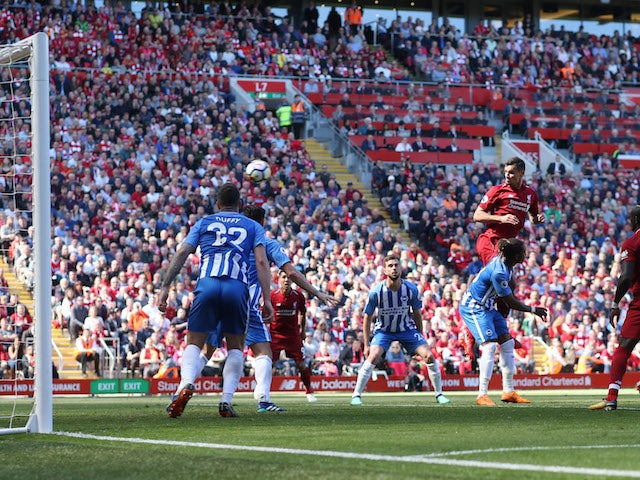 Dejan Lovren scores the second during the Premier League game between Liverpool and Brighton & Hove Albion on May 13, 2018