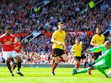 Marcus Rashford scores the opener during the Premier League game between Manchester United and Watford on May 13, 2018