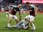 Pablo Zabaleta and Mark Noble of West Ham in action with Phil Jones of Manchester United on May 10, 2018