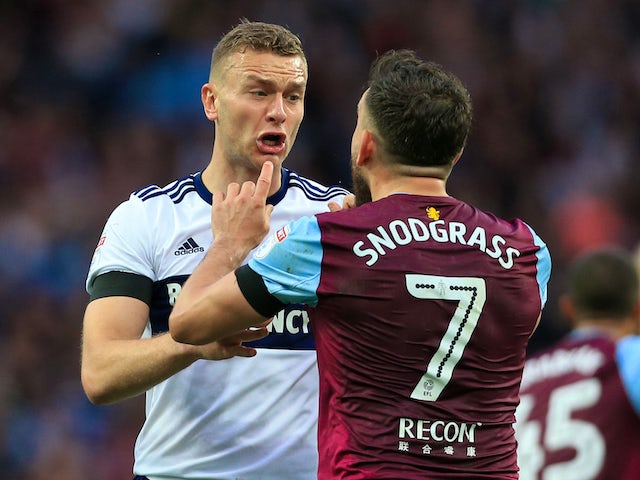 Ben Gibson and Robert Snodgrass argue during the Championship playoff semi-final between Aston Villa and Middlesbrough on May 15, 2018