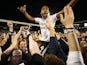Match-winner Denis Odoi celebrates with fans after the Championship playoff semi-final between Fulham and Derby County on May 14, 2018
