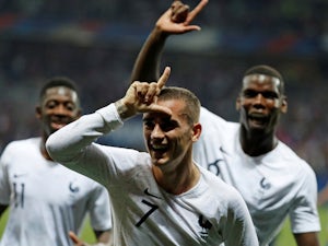 Griezmann leaps to Pogba defence