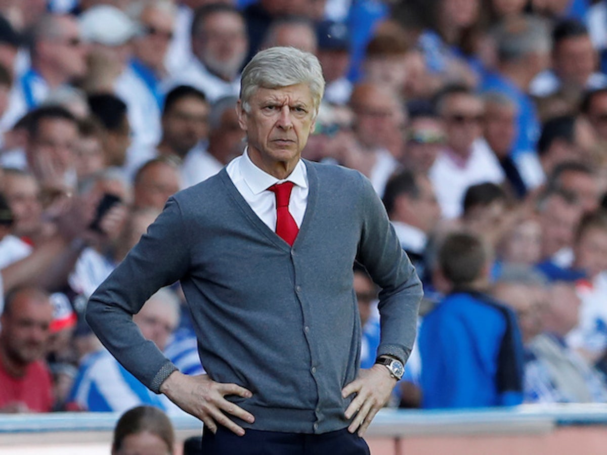 Arsene Wenger Admits His Coat Was Too Long Sports Mole