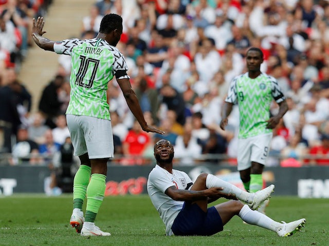 John Obi Mikel takes down Raheem Sterling during the international friendly between England and Nigeria at Wembley on June 2, 2018