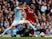 John Stones takes on Mohamed Salah during the Premier League game between Manchester City and Liverpool on September 9, 2017