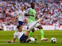 John Stones in action with Odion Ighalo during the international friendly between England and Nigeria at Wembley on June 2, 2018
