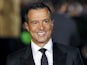 Agent Jorge Mendes poses for photographers on the red carpet at the world premiere of 'Ronaldo' at Leicester Square on November 9, 2015