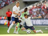 Kieran Trippier, Eric Dier and Victor Moses in action during the international friendly between England and Nigeria at Wembley on June 2, 2018