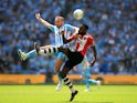 Liam Kelly and Hiram Boateng in action during the League Two playoff final between Exeter City and Coventry City on May 28, 2018