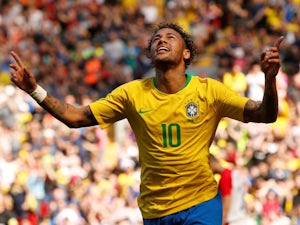 Neymar helps Brazil to victory on return