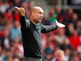 Manchester City manager Pep Guardiola watches on during the Premier League clash with Southampton on May 13, 2018