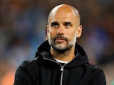 Manchester City manager Pep Guardiola watches on during the Premier League clash with Brighton on May 9, 2018
