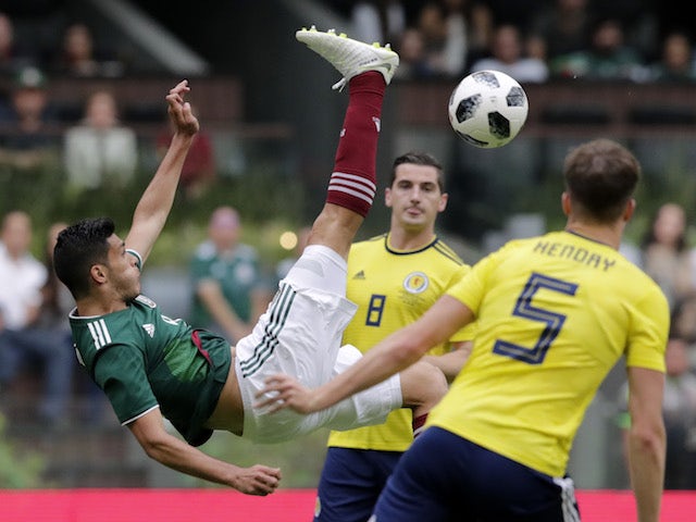 Raul Jimenez in action during the international friendly between Mexico and Scotland on June 3, 2018