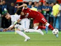 Sergio Ramos takes out Mohamed Salah during the Champions League final between Real Madrid and Liverpool on May 26, 2018