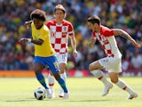 Brazil forward Willian runs with the ball during the World Cup warm-up match against Croatia at Anfield on June 3, 2018