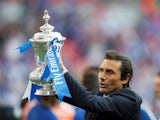 Chelsea boss Antonio Conte poses with the FA Cup on May 19, 2018