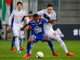 Marseille's Lucas Ocampos in action with Troyes's Charles Traore on December 20, 2017 