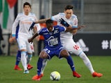 Marseille's Lucas Ocampos in action with Troyes's Charles Traore on December 20, 2017 