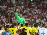 Colombia goalkeeper David Ospina leads the celebrations as his side qualify for the World Cup following a 1-1 draw with Peru