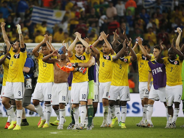 Colombia celebrate after beating Uruguay in the last 16 of the 2014 World Cup
