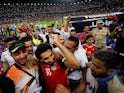 Egypt's Mohamed Salah celebrates with fans after scoring the goal which took his side to the 2018 World Cup