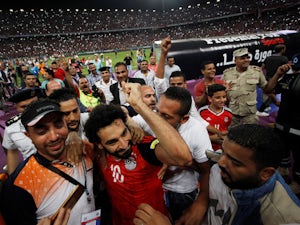 Egypt's Mohamed Salah celebrates with fans after scoring the goal which took his side to the 2018 World Cup