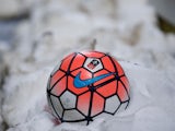 A football nestling in snow, sighted on January 19, 2016