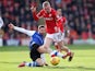 Barnsley's Oliver McBurnie in action with Sheffield Wednesday's Frederico Venancio on February 10, 2018
