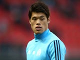 Marseille's Hiroki Sakai warms up before the match against Rennes on January 13, 2018