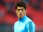 Marseille's Hiroki Sakai warms up before the match against Rennes on January 13, 2018