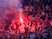 Liverpool fans light a flare inside the stadium before the Champions League semi-final second leg against Roma on May 2, 2018