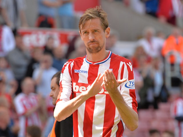 Late Peter Crouch strike earns Stoke a replay
