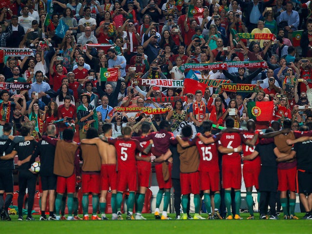 The Portugal players celebrate with their fans after their win over Switzerland in October 2017 which sealed their place at the 2018 World Cup
