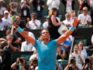Nadal battles through to Wimbledon last 32